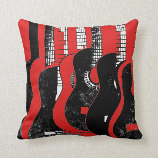 Almohada roja y negra de las guitarras