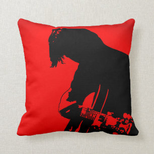 Almohada roja y negra del guitarrista