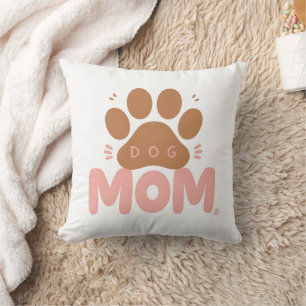 Almohada rosa con huella de pata de perro adorable