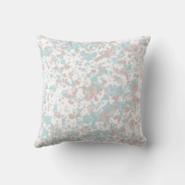 almohada rosa y azul salpicada