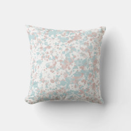 almohada rosa y azul salpicada