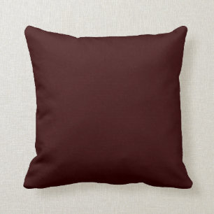 almohada sólida de color marrón oscuro