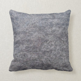 Almohada texturizada mármol manchado gris apoyada