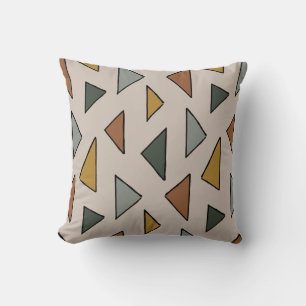 Almohada triangular cálida y terrenal