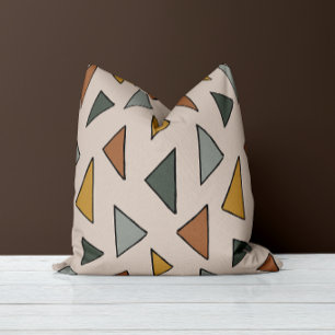Almohada triangular cálida y terrenal