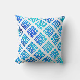 Almohada tribal con patrón de llave pintado en aqu