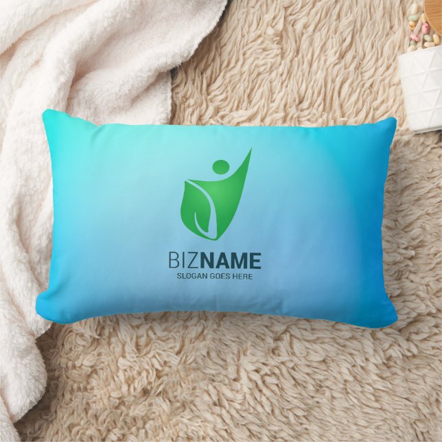 Almohada turquesa con un logotipo de figura abstra (Manta)