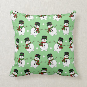 Almohada verde hermosa del muñeco de nieve