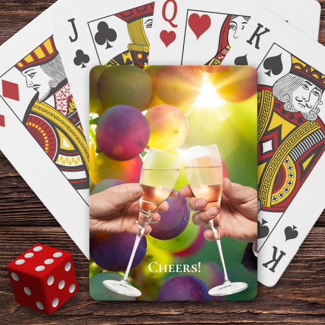 Amantes del Vino Alegran Las Cartas De Juego (Deck of cards featuring a toast with wine glasses on a colorful grapes background)