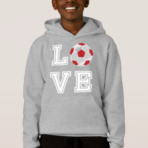 Amar la pelota roja de fútbol - Letras blancas