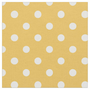 Amarillo y blanco puntea la tela del  