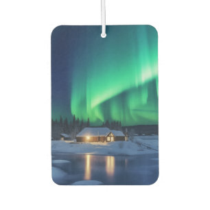Ambientador Aurora borealis sobre la cabaña de invierno