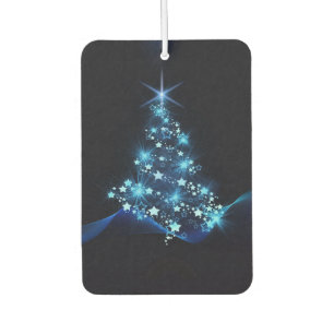 Ambientador Brillo azul de estrellas en árbol de Navidad oscur