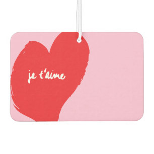 Ambientador Corazón rojo con je t’aime-text sobre fondo rosado