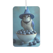 pájaro azul y un bol de arándanos