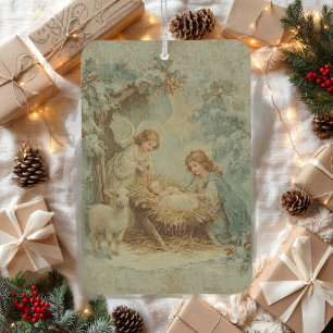 Ambientador tarjeta de Navidad con el niño Jesús en un pesebre