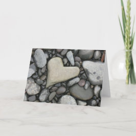 Amor en la tarjeta de felicitación de las rocas