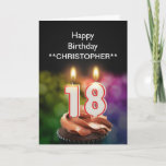 Añadir un nombre a las velas de esta tarjeta de 18<br><div class="desc">Quemando velas de pastel de 18 años en forma de números encima de un quequito de chocolate. Personalizar con el nombre de la persona de cumpleaños. Adecuado para un hombre o una mujer. Ver toda la gama de tarjetas para edades y relaciones en mi tienda. Todos los derechos de autor...</div>