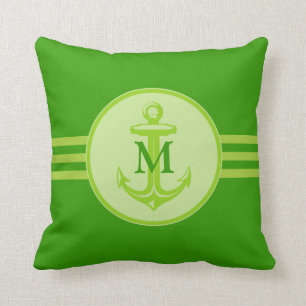 Ancla verde elegante en la almohada con monograma