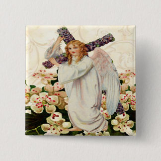 Ángel con botón de cruz