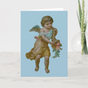 Ángel con la tarjeta de felicitación de la