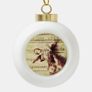 Ángel de cosecha sobre el adorno de cerámica music