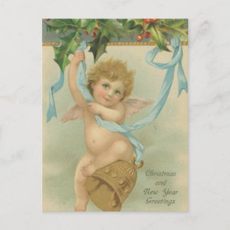Ángel de Navidad de época colgando de Holly