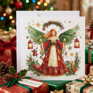 Ángel de Navidad y bayas de invierno