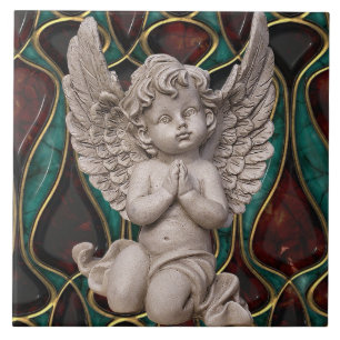 Ángel de rogación de la querube en la teja