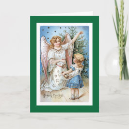 Ángel del navidad con el árbol del ajuste del