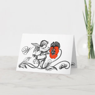 ANGEL PINTANDO UN MONOGRAMA DE FLORES ROJOS