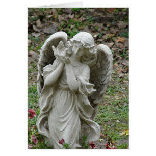 Ángel sosteniendo una estatua de paloma