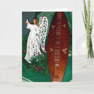 Ángel y tarjeta de felicitación del navidad del