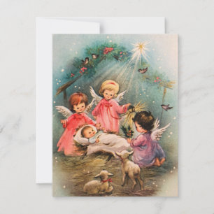 Ángeles de Navidad antiguos cuidando al Niño Jesús