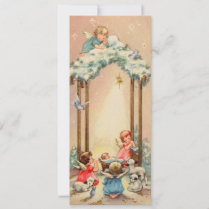 Ángeles vintage de Navidad cuidando al Niño Jesús