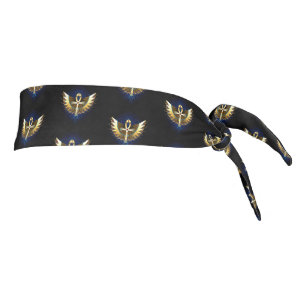 Ankh de oro con alas