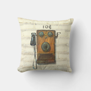 antigüo teléfono de pared tirando almohada