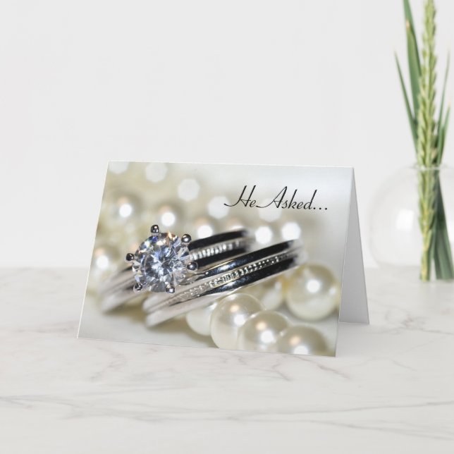 Anuncio de compromiso de anillos y perlas blancas (Anverso)