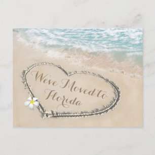 Anuncio de nueva dirección en playa tropical