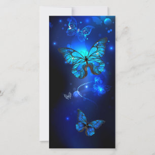 Anuncio Morpho Butterfly in the Dark Background