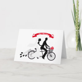 Anuncio Novia recién casada y novio en bicicleta tándem