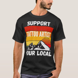 Apoya su camiseta de artista de tatuajes local