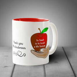 Apple en la taza de aprecio de los profesores