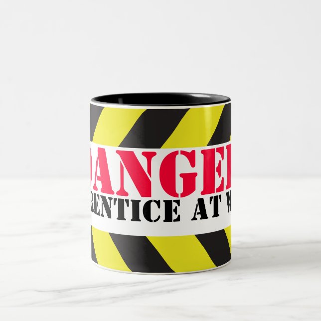 Aprendiz del peligro en la taza de los (Centro)