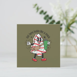 Aquí luciendo como un pastel de Navidad en forma d