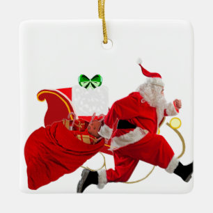 Aquí viene el ornamento de Santa Claus