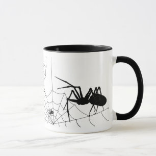 Araña y taza de la tela