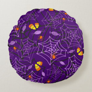 Arañas de Halloween y almohada morada de caramelo