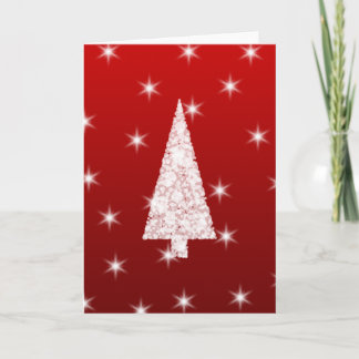 Árbol de navidad blanco con las estrellas en rojo