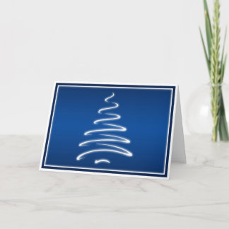 Árbol de navidad del remolino en tarjeta azul y